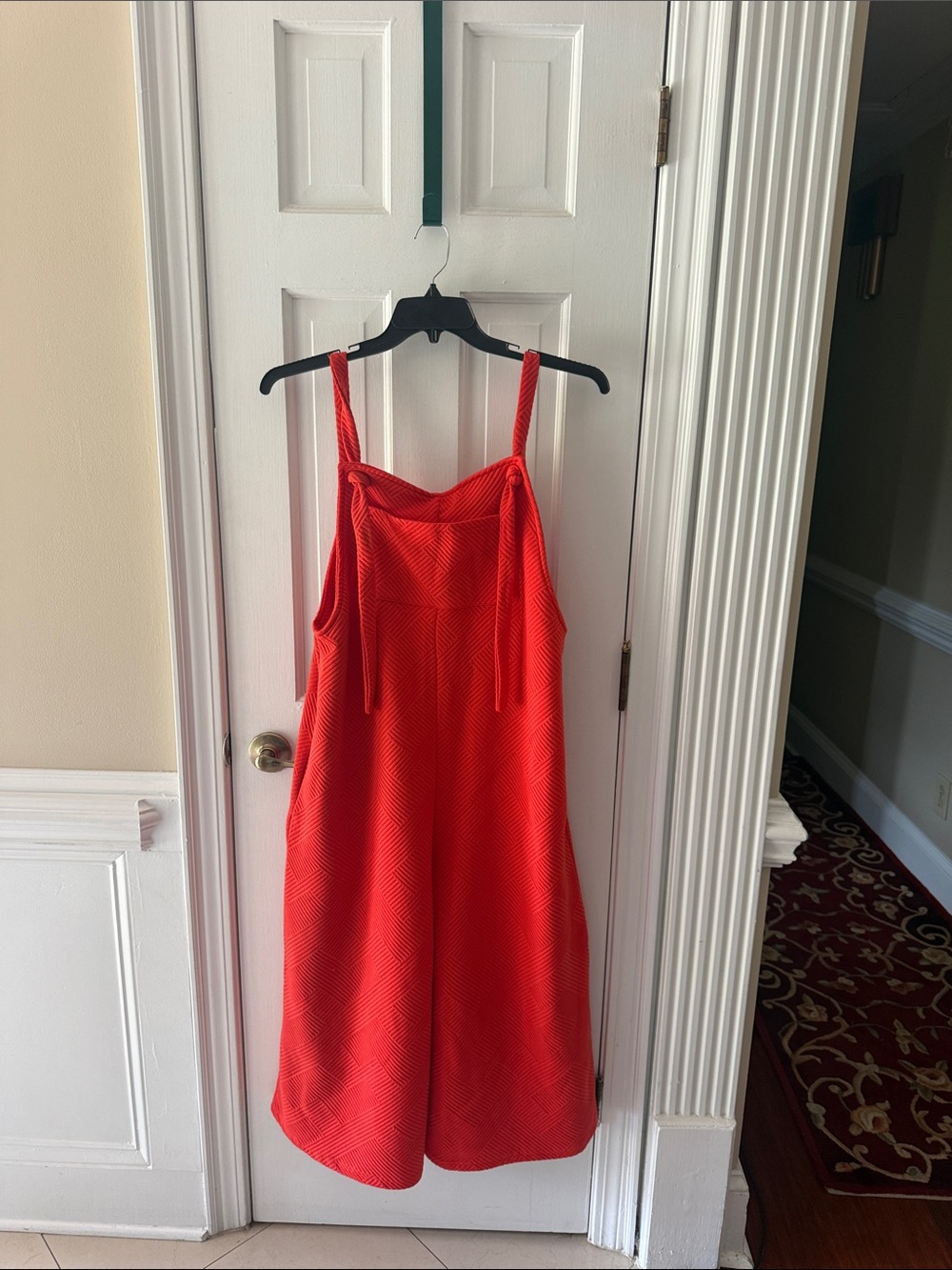 Bright Orange Sleeveless Jumpsuit with Adjustable Straps. Game Day Ready